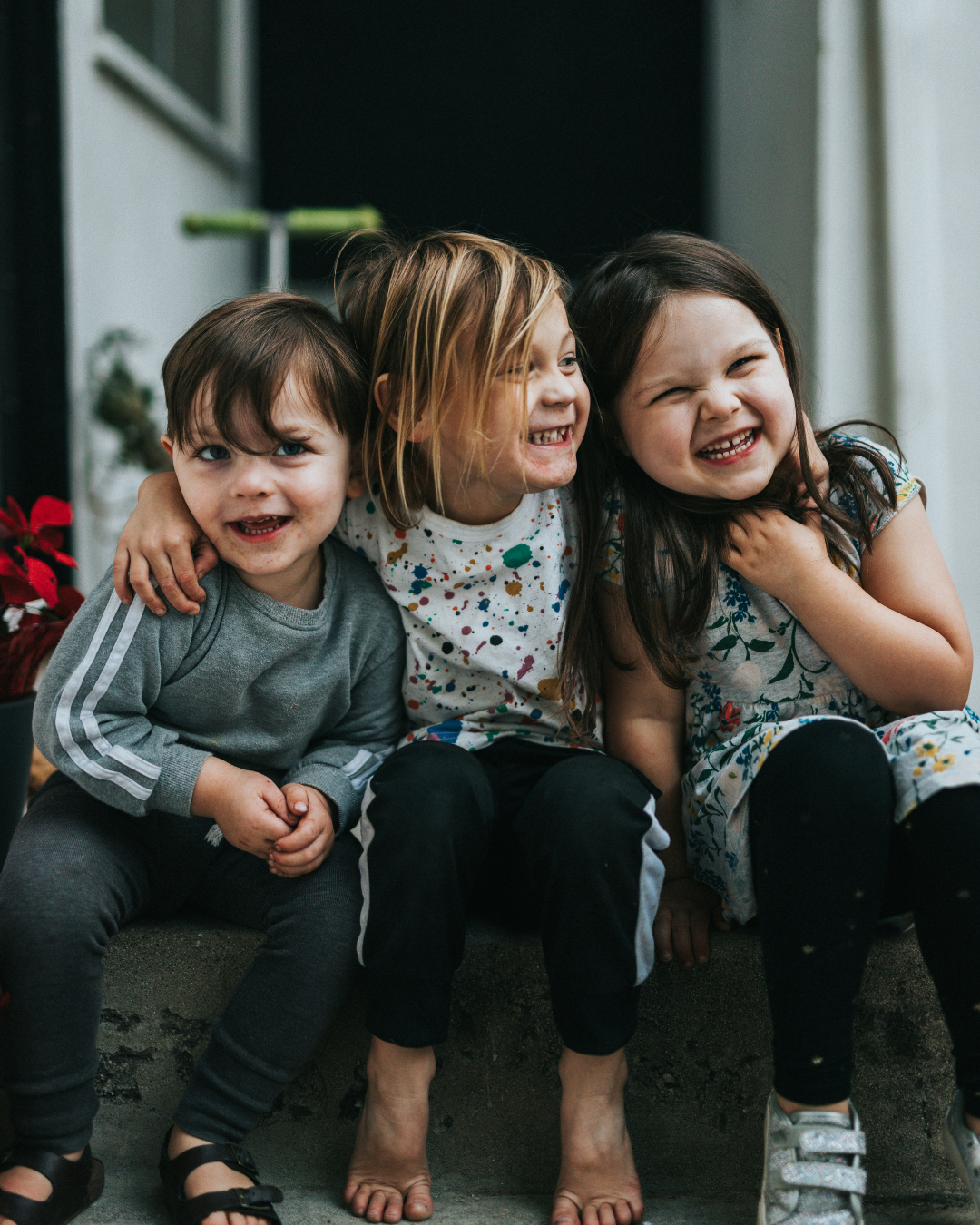 three children smiling
